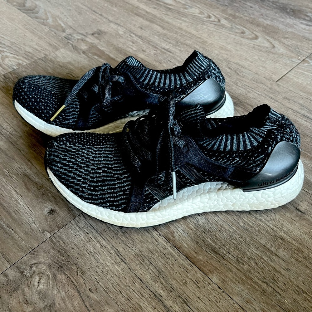Adidas women’s ultra boost. All black with white soles. Size 8.
